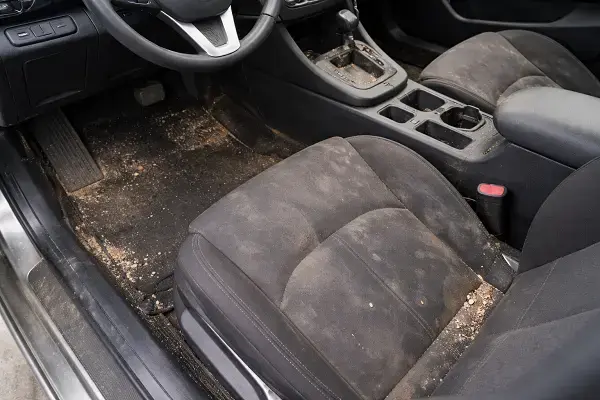 Car Detailing Before(Interior) (1) Car detailing Fresno interior before cleaning with dirty seats and stained carpet.